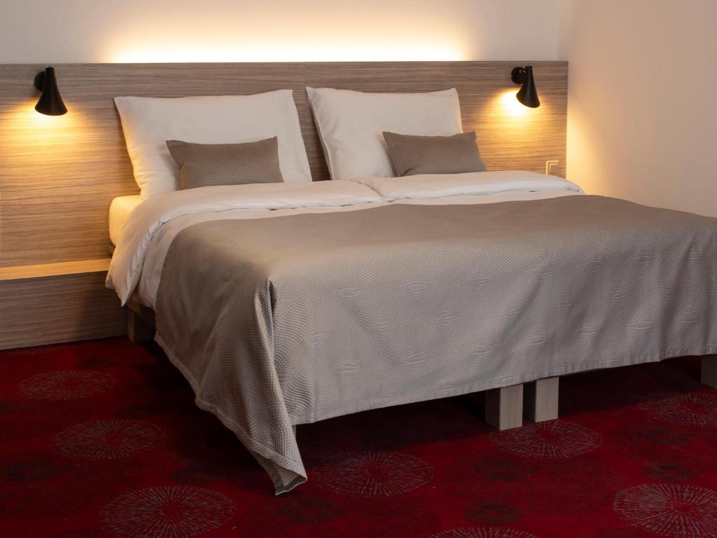 Postel nebo postele na pokoji v ubytování Hotel TAMMEL