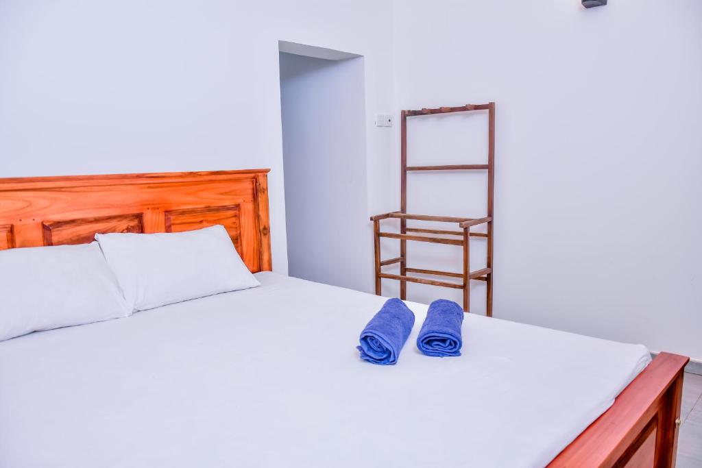 Postel nebo postele na pokoji v ubytování Saman Beach Guest House