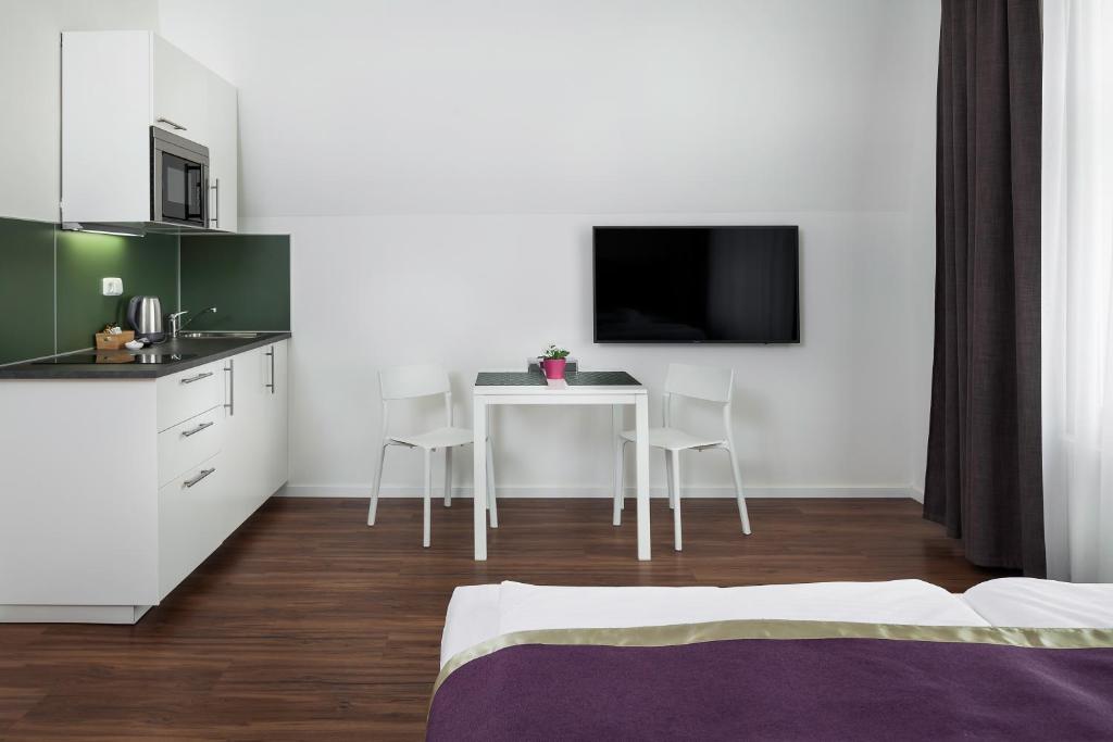 Kuchyň nebo kuchyňský kout v ubytování Elizabeth Suites