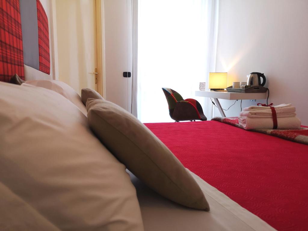 Postel nebo postele na pokoji v ubytování Attico Barocco