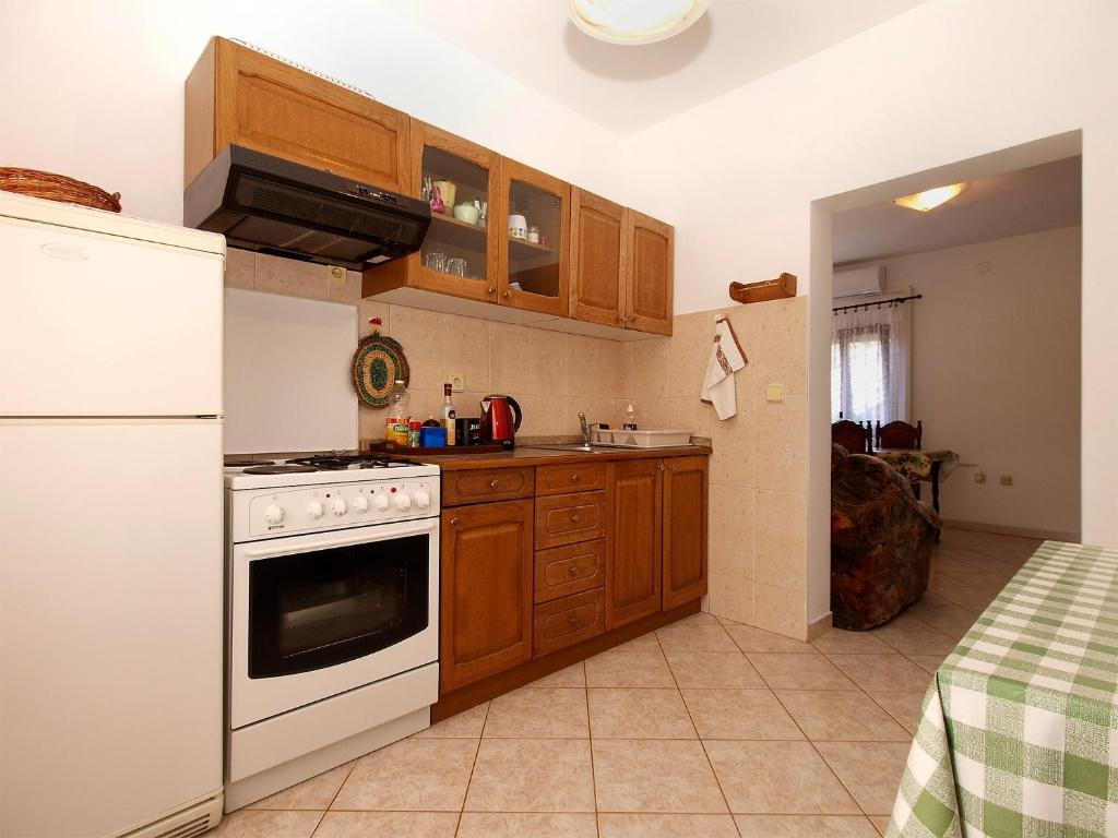 Kuchyň nebo kuchyňský kout v ubytování Apartments Miranda 1858