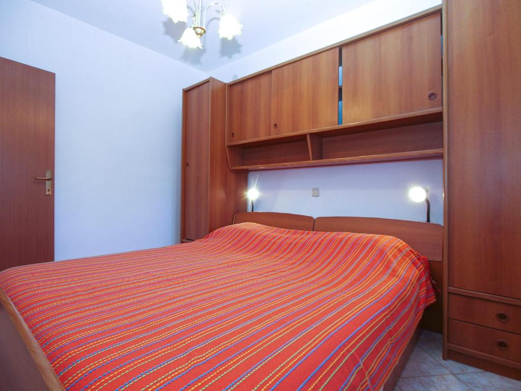 Postel nebo postele na pokoji v ubytování Apartments Miranda 1858