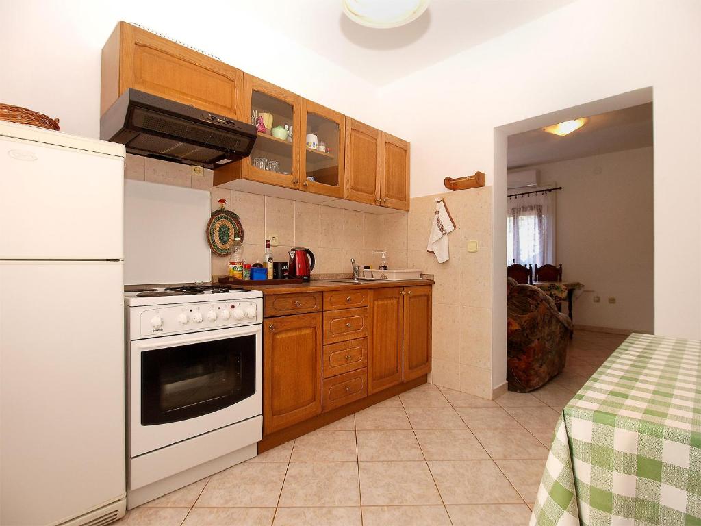 Kuchyň nebo kuchyňský kout v ubytování Apartments Miranda 1858
