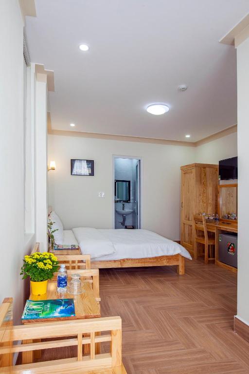 Postel nebo postele na pokoji v ubytování THIEN AN GUEST HOUSE