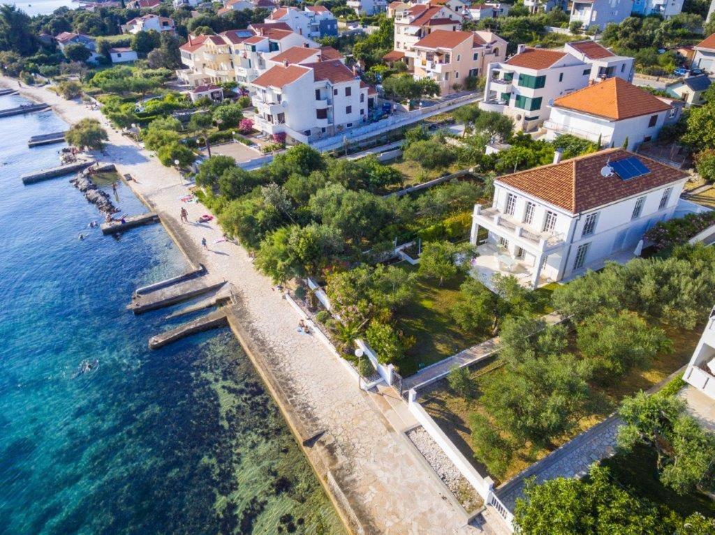 an aerial view of a town next to the water at Luxury Beachfront Villa Smague with Sauna, Zadar in Diklo