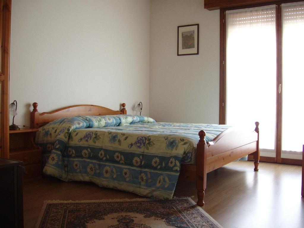 Postel nebo postele na pokoji v ubytování Ai Casali