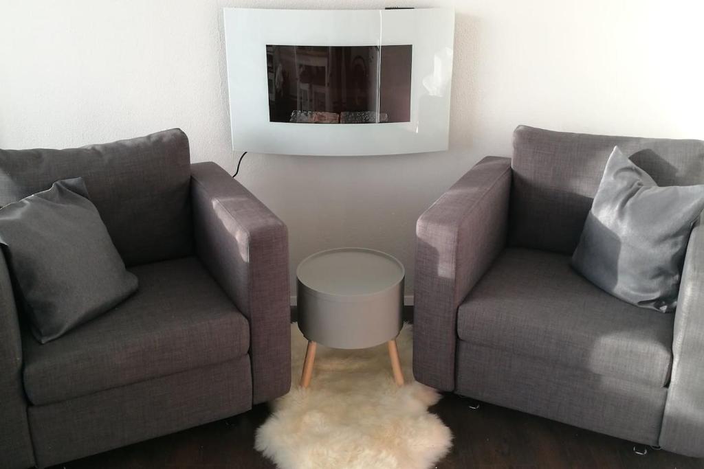 Posezení v ubytování Top Appartment mit Weitblick und Late Check-Out inklusive aktivCARD
