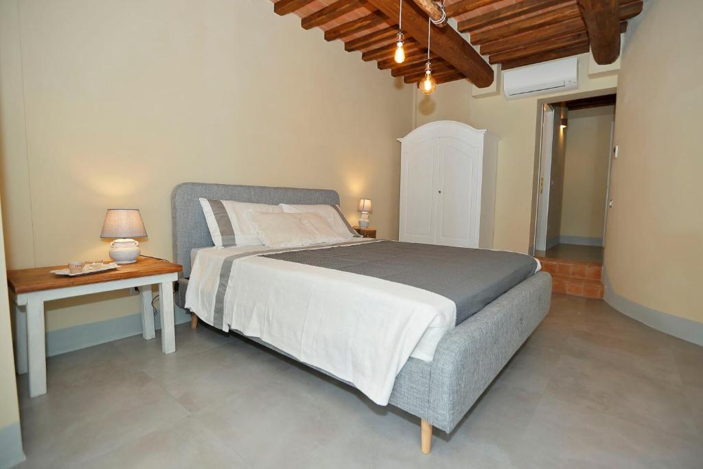 Postel nebo postele na pokoji v ubytování B&B CASAGRANDE