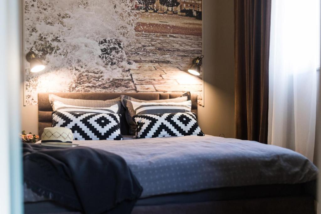 Posteľ alebo postele v izbe v ubytovaní Deluxe Apartment No.8