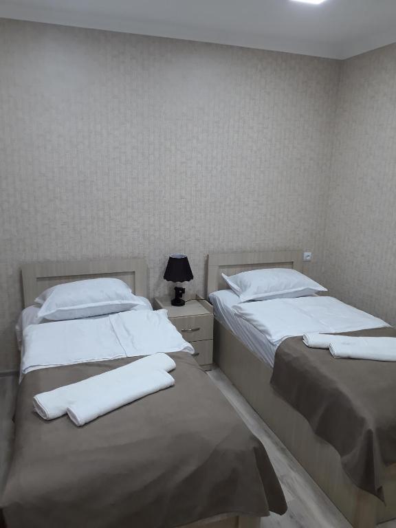 Postel nebo postele na pokoji v ubytování Vardzia in 15