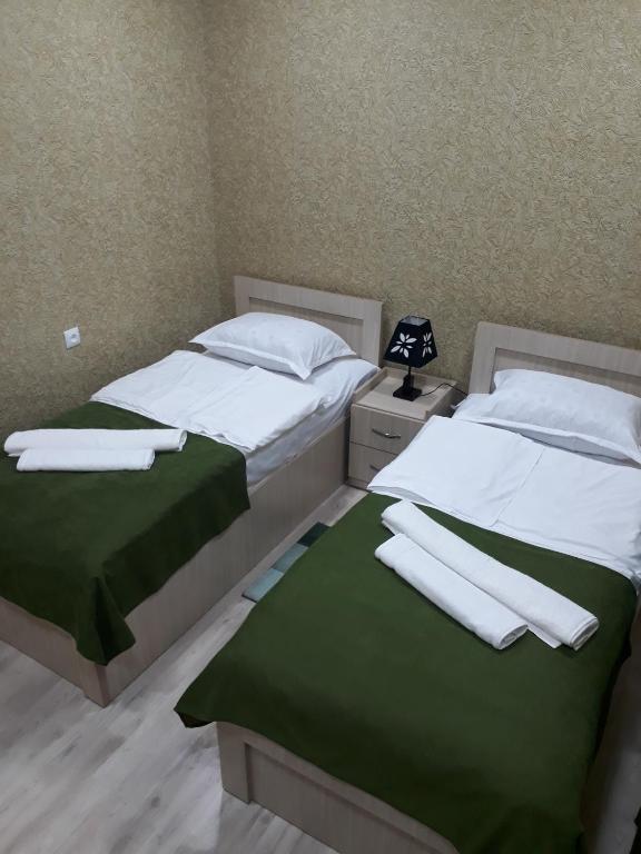 Postel nebo postele na pokoji v ubytování Vardzia in 15
