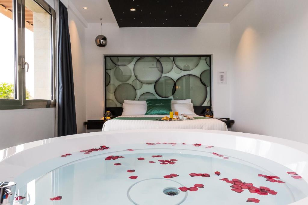 Postel nebo postele na pokoji v ubytování JC Hotel