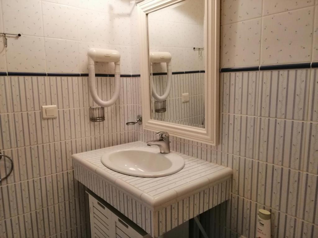 Koupelna v ubytování Chambres d´Hôtes Le Cèdre Bleu