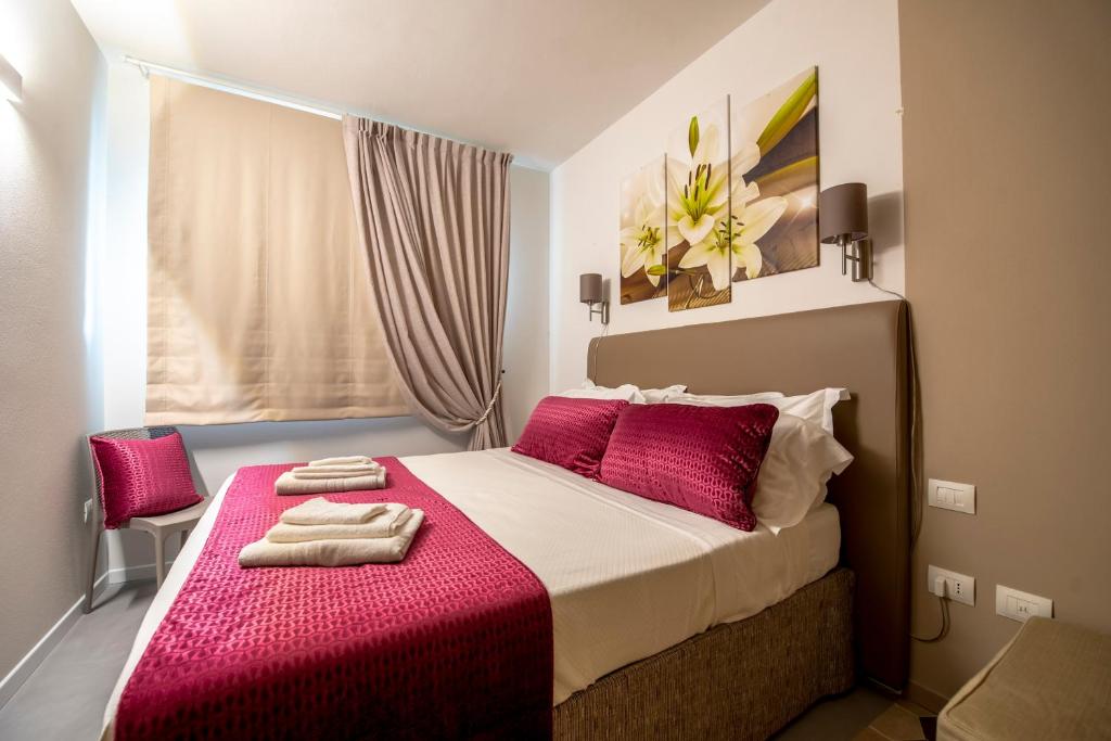 Postel nebo postele na pokoji v ubytování Casa Ercoli B&B