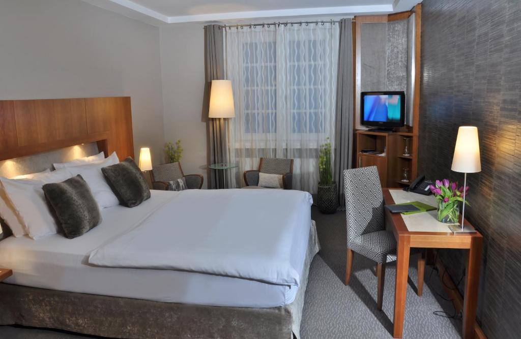 Postel nebo postele na pokoji v ubytování Hotel Eggers Hamburg