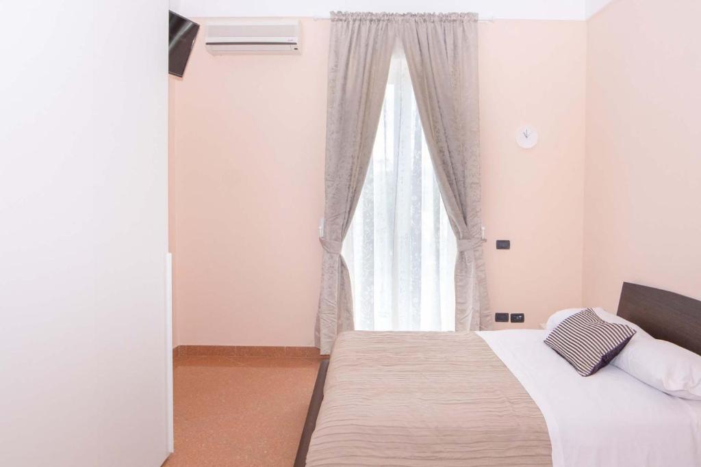 Postel nebo postele na pokoji v ubytování Casa MareLuna