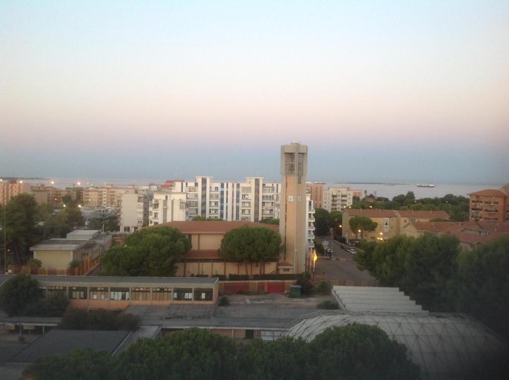 Hotel B&B Al Campanile, a view of a city with a tall building at B&B Al Campanile in Taranto