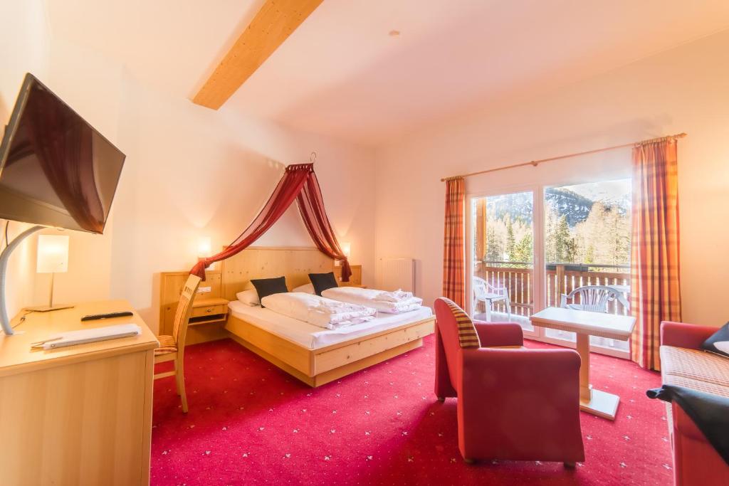 Postel nebo postele na pokoji v ubytování Hotel zum See