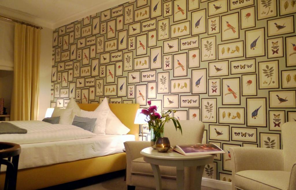 Postel nebo postele na pokoji v ubytování Romantik Hotel Das Lindner
