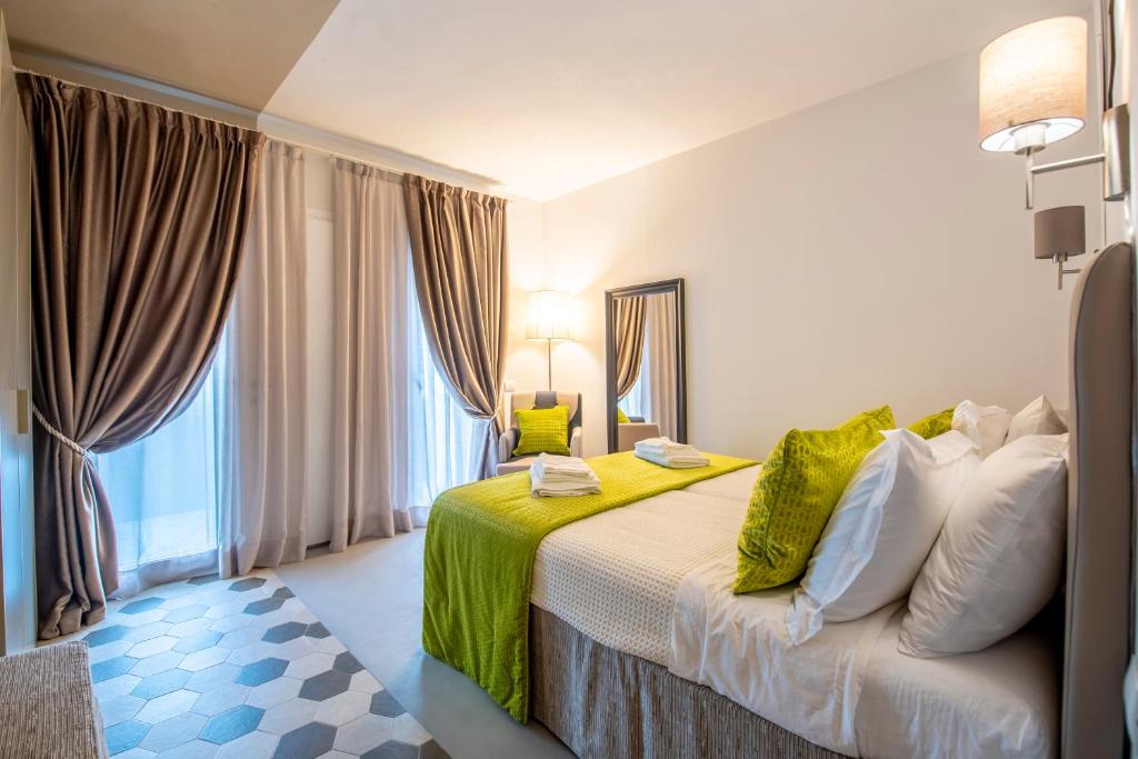 Postel nebo postele na pokoji v ubytování Casa Ercoli B&B
