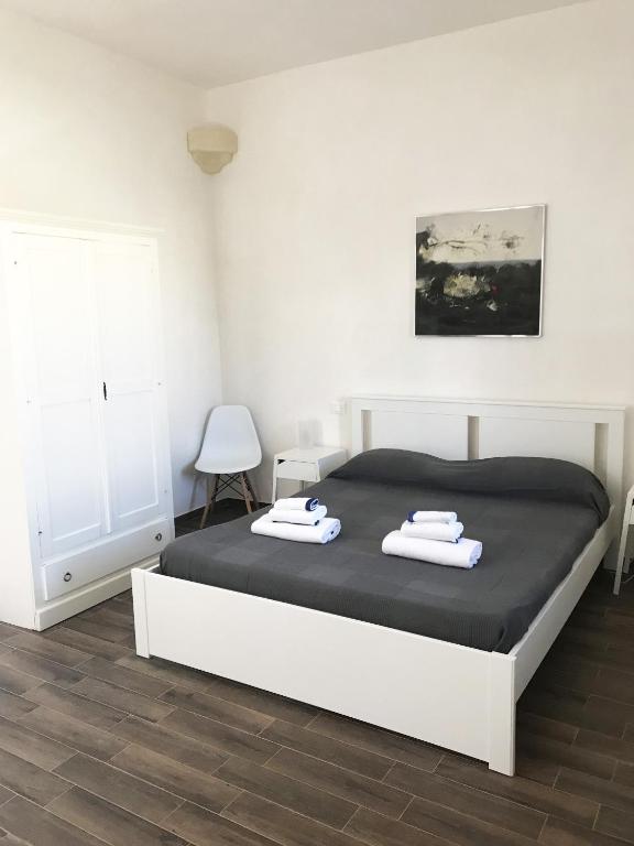 Postel nebo postele na pokoji v ubytování B&b Il Tufo