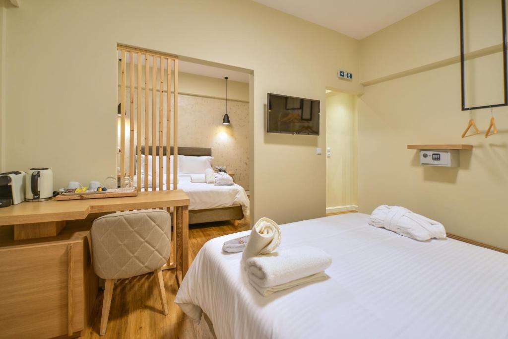 Voodi või voodid majutusasutuse A.P. Acropolis View Apartments toas