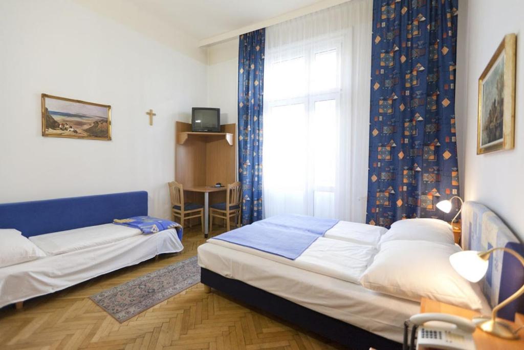 Postel nebo postele na pokoji v ubytování Hotel-Pension Bleckmann