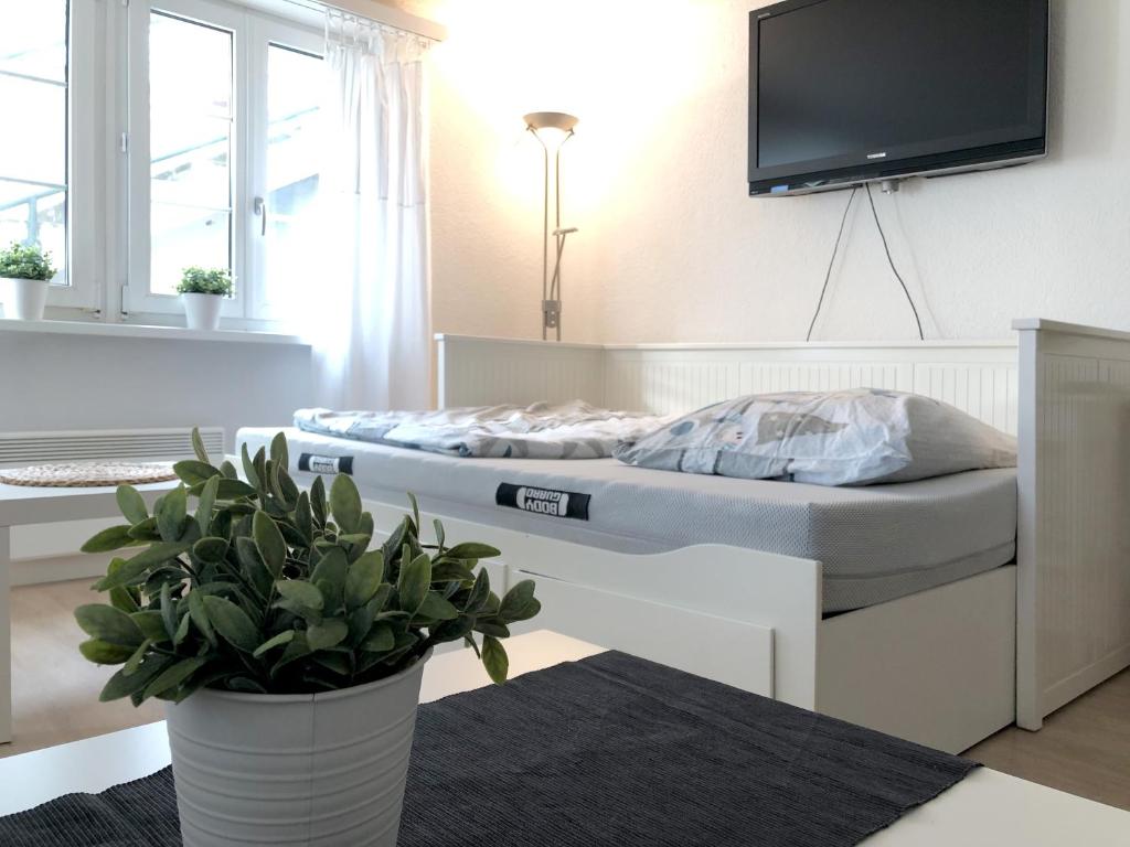 Postel nebo postele na pokoji v ubytování Ferienwohnung Erlinsbach SO