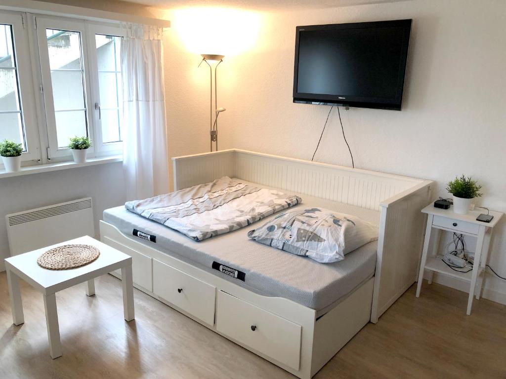 Postel nebo postele na pokoji v ubytování Ferienwohnung Erlinsbach SO