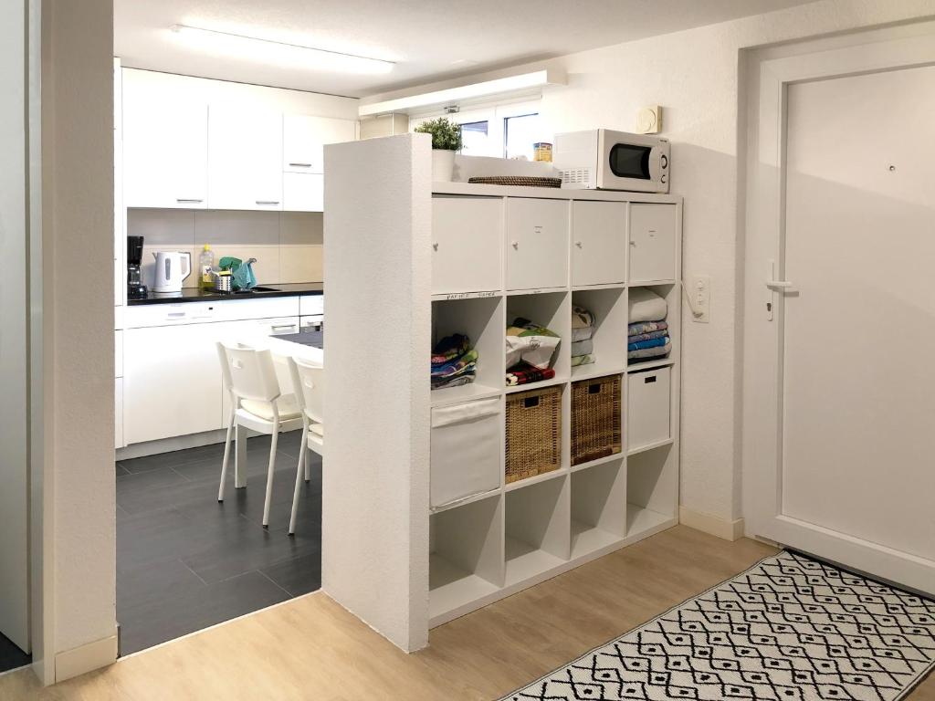 Kuchyň nebo kuchyňský kout v ubytování Ferienwohnung Erlinsbach SO