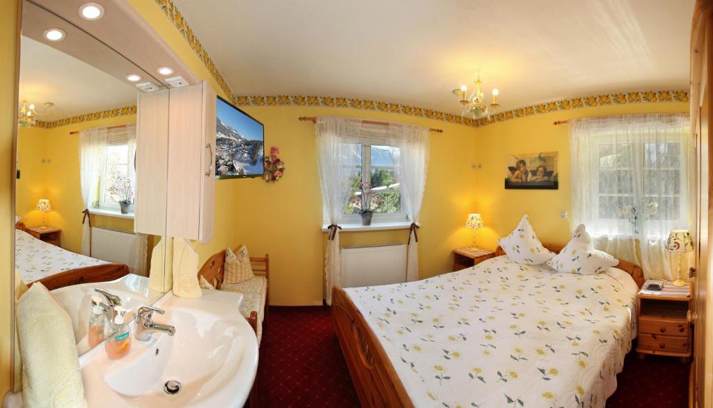 Postel nebo postele na pokoji v ubytování Appartements Kaiserblick