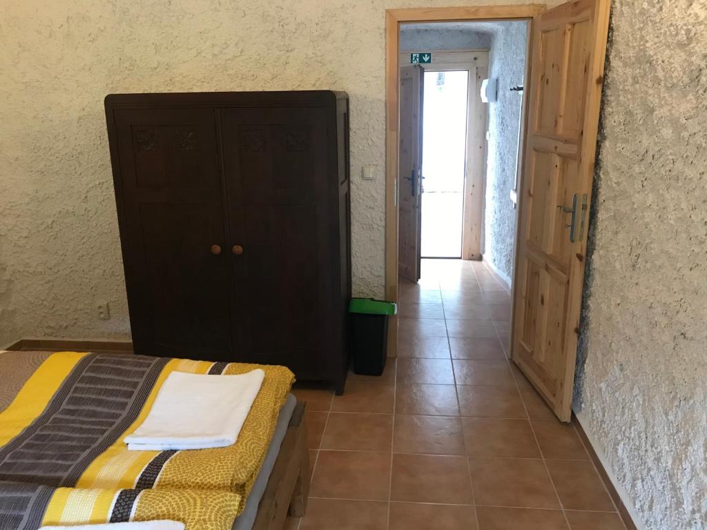 Postel nebo postele na pokoji v ubytování Statek u Potoka