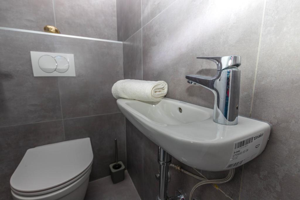 Kúpeľňa v ubytovaní Apartments Ines