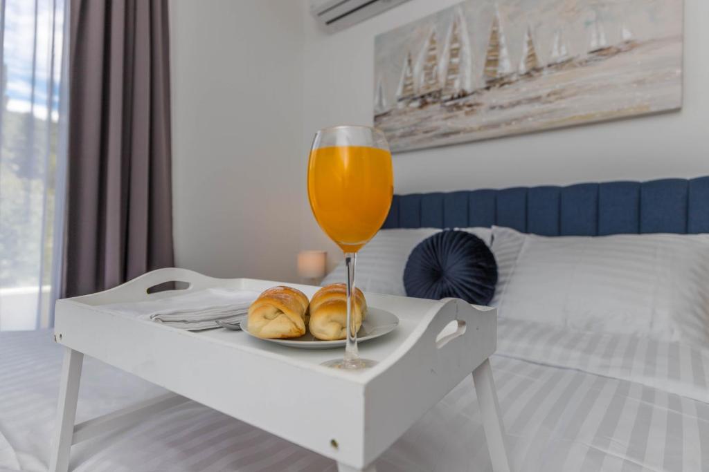 Posteľ alebo postele v izbe v ubytovaní Apartments Ines