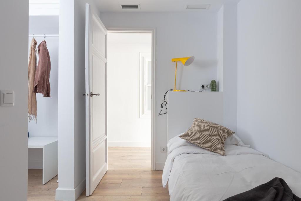 Postel nebo postele na pokoji v ubytování Casa Cosi - Eixample 4