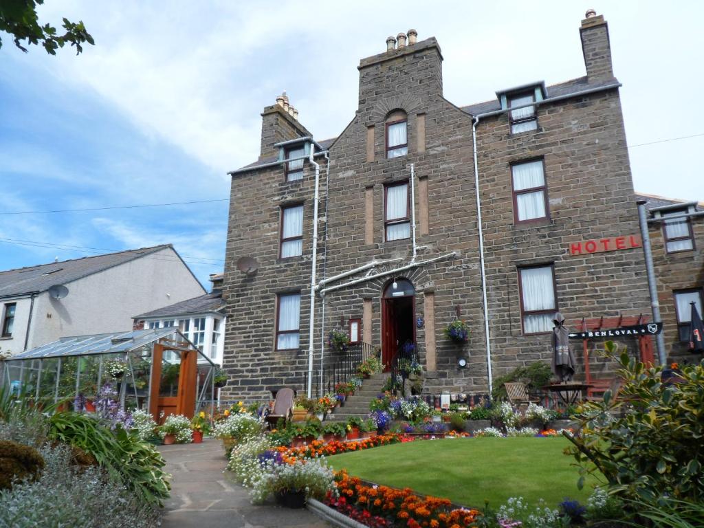 a hotel with a garden in front of it at Nethercliffe Hotel in Wick