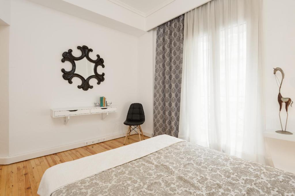 Posteľ alebo postele v izbe v ubytovaní Hippodrome Flatlet
