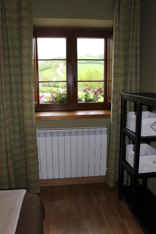 Postel nebo postele na pokoji v ubytování Hostal Rural Iratiko Urkixokoa
