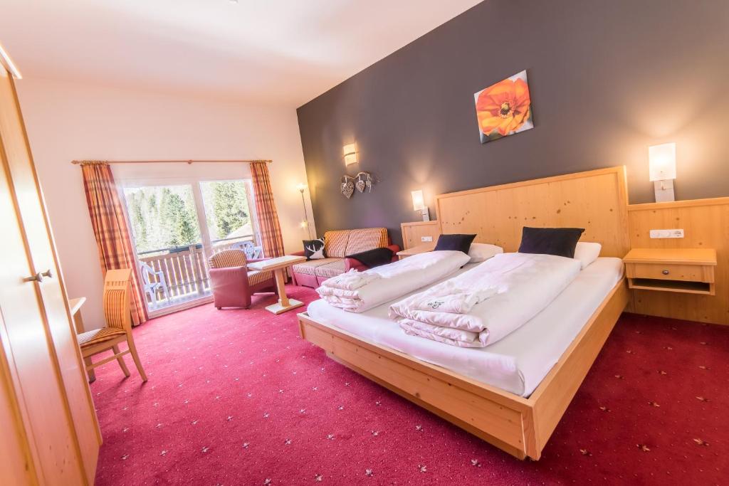 Postel nebo postele na pokoji v ubytování Hotel zum See
