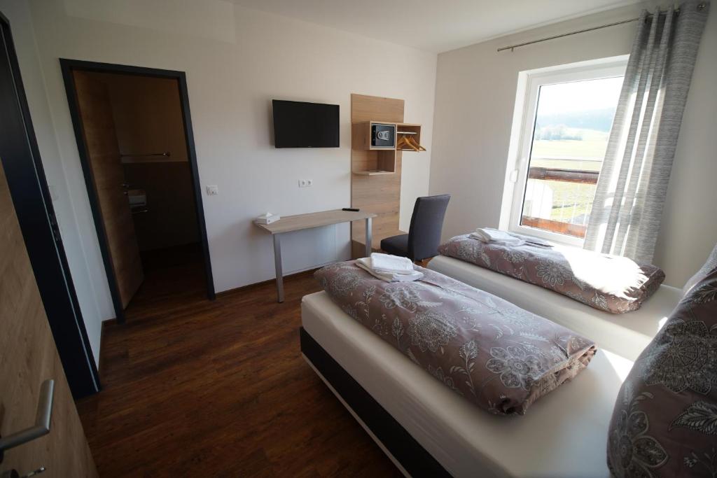 Postel nebo postele na pokoji v ubytování Nürburgring Aparts