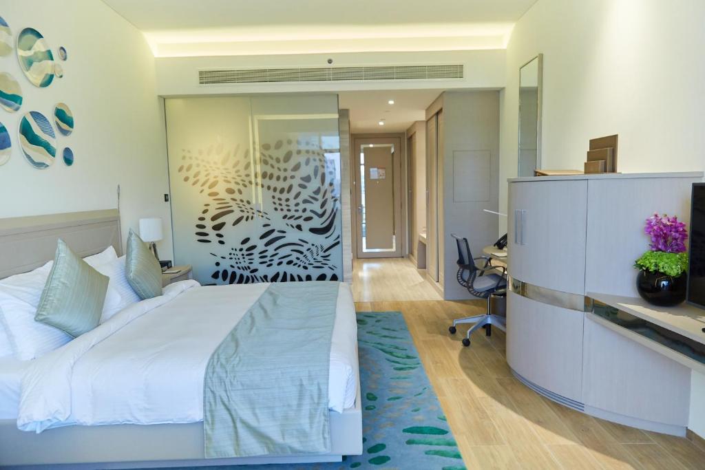 Katil atau katil-katil dalam bilik di Royal M Hotel Abu Dhabi by Gewan