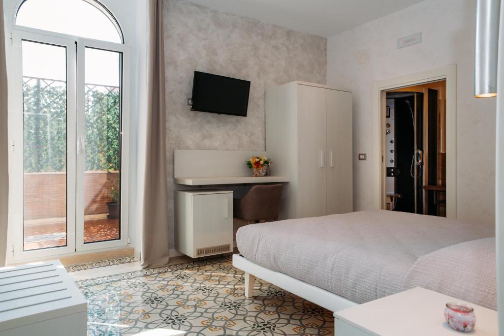 TV a/nebo společenská místnost v ubytování B&B Villa Belvedere