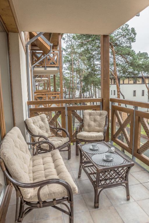 Balkon lub taras w obiekcie Mi Casa Holidays Rezydencja Park Rodzinna