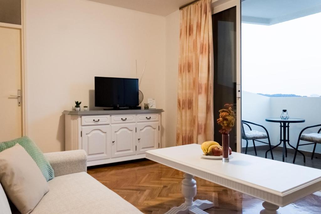 TV a/nebo společenská místnost v ubytování Apartment Princino