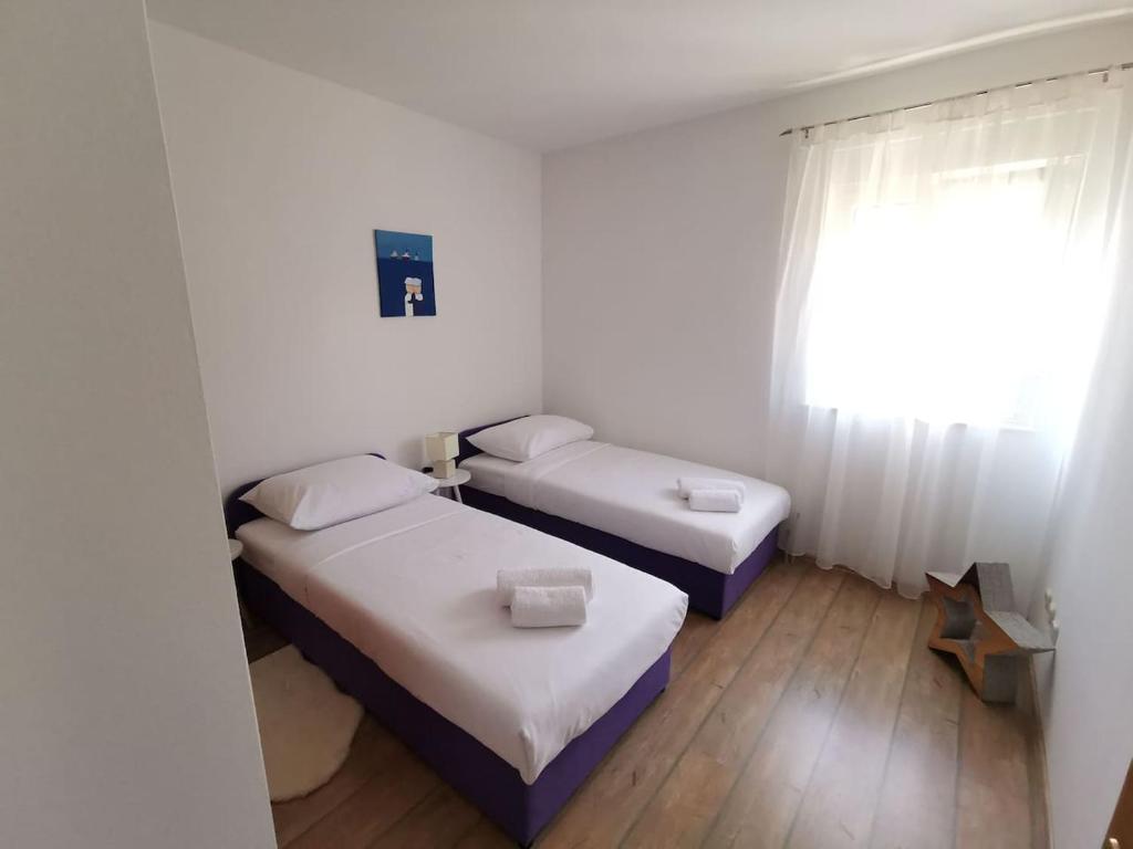 Postel nebo postele na pokoji v ubytování House MARIO