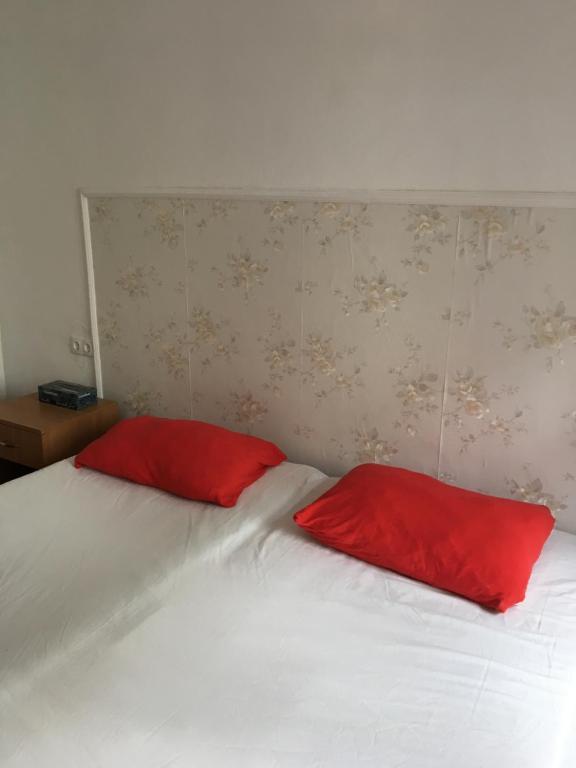 Ένα ή περισσότερα κρεβάτια σε δωμάτιο στο Tower Apartament