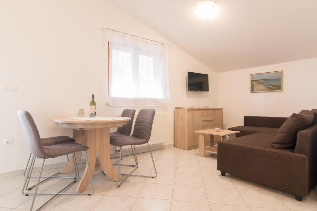 Posedenie v ubytovaní Apartman Deni