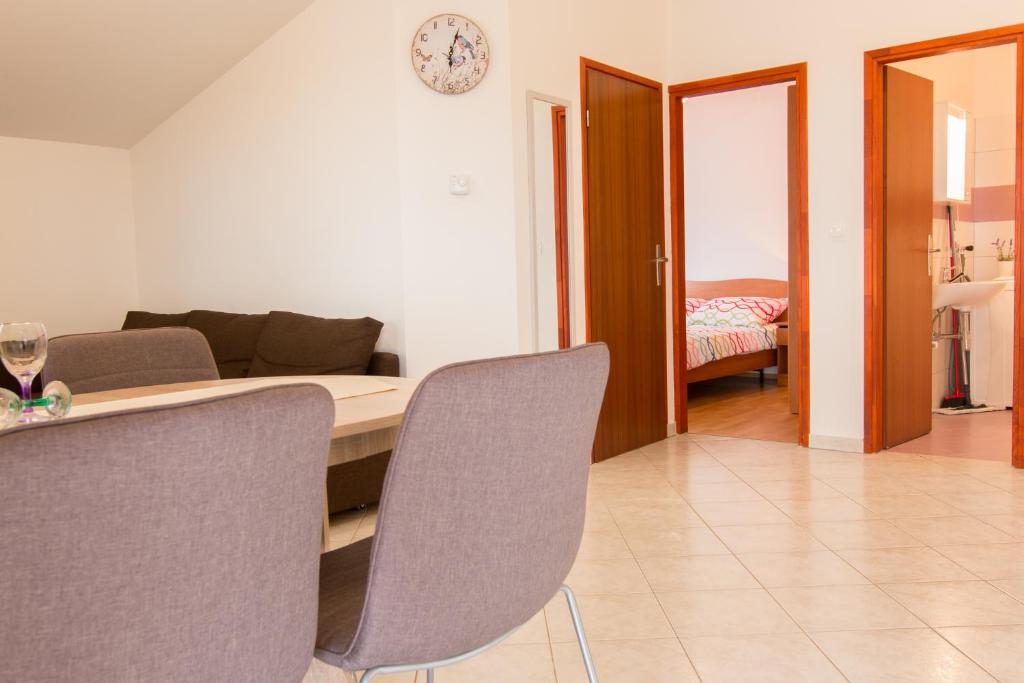 Posteľ alebo postele v izbe v ubytovaní Apartman Deni