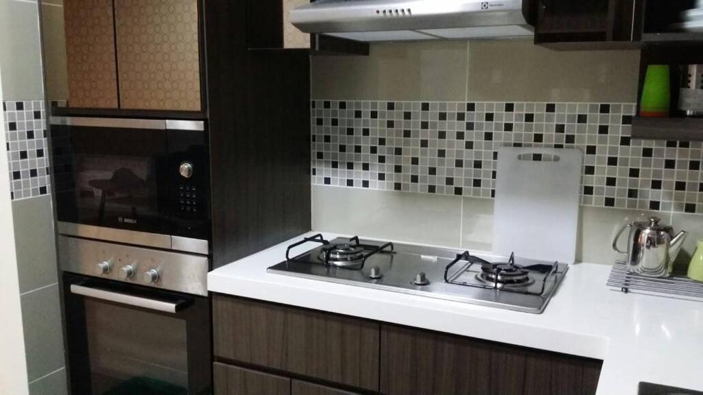Kuchyň nebo kuchyňský kout v ubytování Bayu TAMARA RESIDENCE PUTRAJAYA