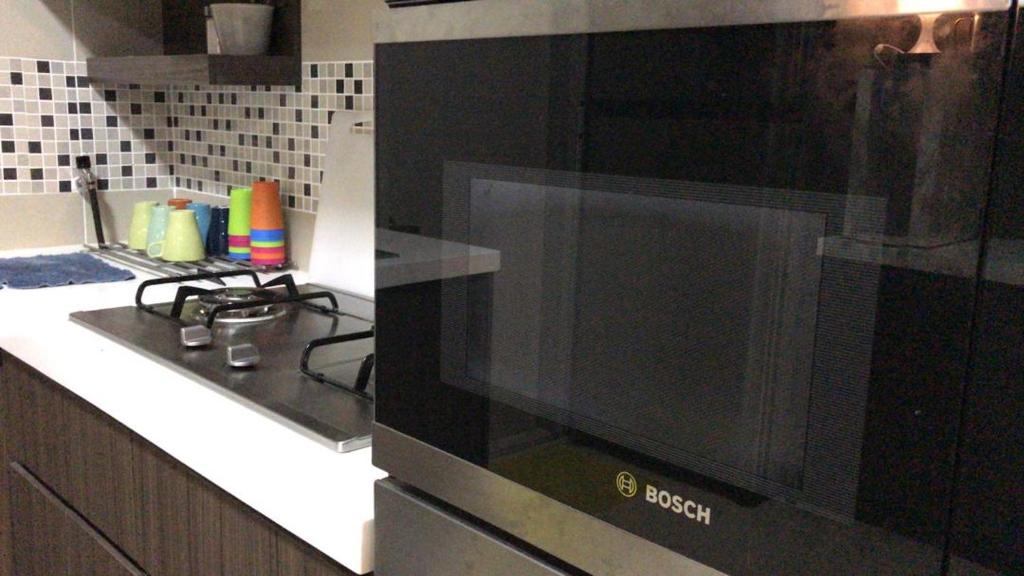 Kuchyň nebo kuchyňský kout v ubytování Bayu TAMARA RESIDENCE PUTRAJAYA